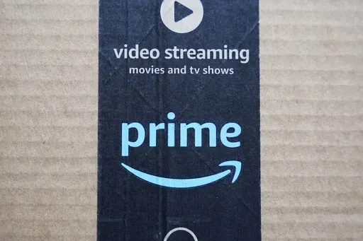 An Amazon Prime cardboard shipping box label is seen on March 17, 2023, in East Derry, N.H. Amazon Prime Day is here. And experts are reminding consumers to be wary of scams. (AP Photo/Charles Krupa, File)