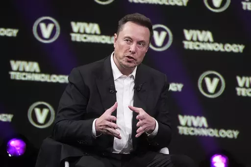 Elon Musk, who owns Twitter, Tesla and SpaceX, speaks at the Vivatech fair, in Paris, France, Friday, June 16, 2023. The head of Elon Musk’s social media platform X says the company formerly known has Twitter has removed hundreds of Hamas-linked accounts and taken down or labeled thousands of pieces of content since the militant group’s attack on Israel. (AP Photo/Michel Euler, File)