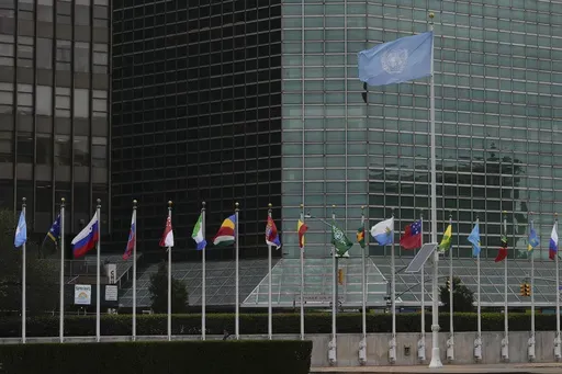 Flags fly outside the United Nations headquarters during the 79th session of the UN General Assembly, Wednesday, Sept. 25, 2024. (AP Photo/Julia Demaree Nikhinson)