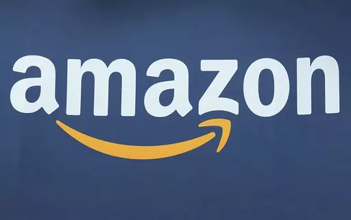 The Amazon logo is seen, June 15, 2023, at the Vivatech show in Paris. Amazon.com is being added to the Dow Jones Industrial Average, joining Apple, Walt Disney, Walmart and other companies that make up the 30-stock average. (AP Photo/Michel Euler, File)