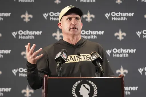 New Orleans Saints interim head coach Darren Rizzi answers questions after an NFL football game against the Los Angeles Rams, Sunday, Dec. 1, 2024, in New Orleans. (AP Photo/Gerald Herbert)