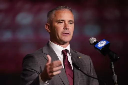 Florida State head coach Mike Norvell speaks during the Atlantic Coast Conference NCAA college football media days Wednesday, July 26, 2023, in Charlotte, N.C. Florida State's most anticipated season in nearly a decade begins in three weeks against Southeastern Conference heavyweight LSU in Orlando. (AP Photo/Erik Verduzco, File)