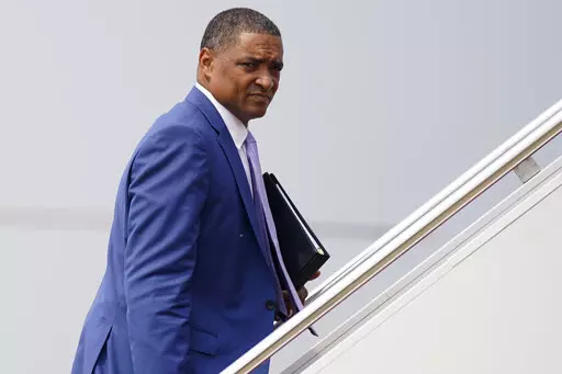 White House adviser Cedric Richmond board board Air Force One at Andrews Air Force Base, Md., July 21, 2021, to travel to Cincinnati with President Joe Biden. Richmond, one of Biden's closest aides is leaving the White House to take on a role as senior adviser to the Democratic National Committee.(AP Photo/Andrew Harnik, File)