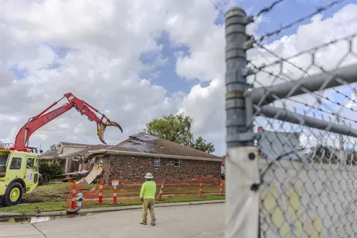 Houses in the Gordon Plaza neighborhood of New Orleans are demolished to make way for a solar panel farm, Wednesday, Oct. 30, 2024. (Chris Granger/The Times-Picayune/The New Orleans Advocate via AP)