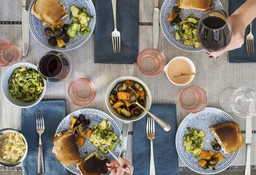 A table spread featuring turkey reuben sandwiches appear in New York on Oct. 17, 2017. (Katie Workman via AP)