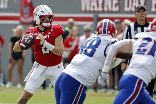 North Carolina State quarterback Grayson McCall (2) looks to pass against Louisiana Tech during the first half of an NCAA college football game in Raleigh, N.C., Saturday, Sept. 14, 2024. (AP Photo/Karl B DeBlaker)