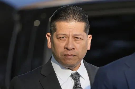 Former Uvalde Consolidated Independent School District police officer Adrian Gonzales arrives at the Uvalde County Courthouse, Thursday, July 25, 2024, in Uvalde, Texas. Gonzales made his first court appearance on charges of abandoning and failing to protect children. (AP Photo/Eric Gay)