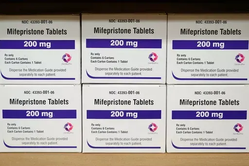 Boxes of the drug mifepristone sit on a shelf at the West Alabama Women's Center in Tuscaloosa, Ala., on March 16, 2022. Louisiana lawmakers have approved a first-of-its-kind bill that would classify two abortion-inducing drugs as a controlled and dangerous substance. The final Senate vote Thursday, May 23, 2024, came despite widespread criticism from doctors, who note that the drugs have other critical reproductive health care uses. (AP Photo/Allen G. Breed, File)