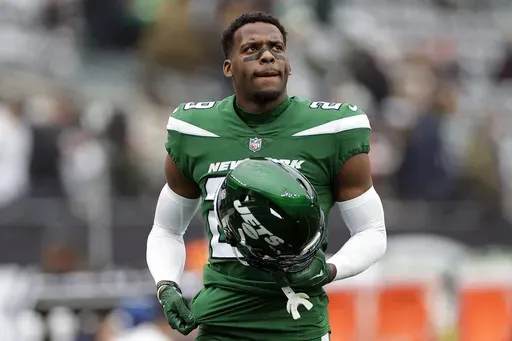 New York Jets safety Jarrick Bernard-Converse (29) warms up before facing the Washington Commanders during an NFL football game, Sunday, Dec. 24, 2023, in East Rutherford, N.J. (AP Photo/Adam Hunger, File)