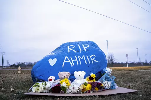 A rock is painted to memorialize Perry High School shooting victim Ahmir Jolliff at the school on Saturday, Jan. 6, 2024, in Perry, Iowa. (Lily Smith/The Des Moines Register via AP)