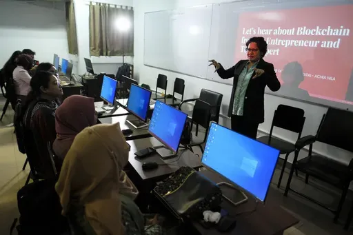 Achia Nila, founder of 'Women in Digital' technology center addresses a workshop at a university in Dhaka, Bangladesh, Dec. 26, 2023. Nila said many youngsters feel frustrated with corruption and bureaucracy and prefer to migrate to other countries because of “better opportunities”. Ahead of the Jan. 7 vote being boycotted by the main opposition, Prime Minister Sheikh Hasina is trying to woo the country’s first-time voters by carrying forward her government’s “Digital Bangladesh” pro