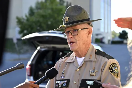 Deputy Gilbert Acciardo, Public information Officer with the Laurel County Sheriff's Office, gives details on the progress of the investigation of the shooting along I-75 in London, Ky., Sunday, Sept. 8, 2024. (AP Photo/Timothy D. Easley)