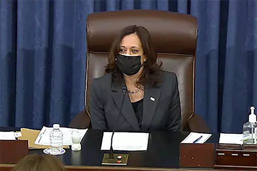 In this image from Senate TV, Vice President Kamala Harris sits in the chair on the Senate floor to cast the tie-breaking vote, her first, Feb. 5, 2021, at the Capitol in Washington. (Senate TV via AP, File)