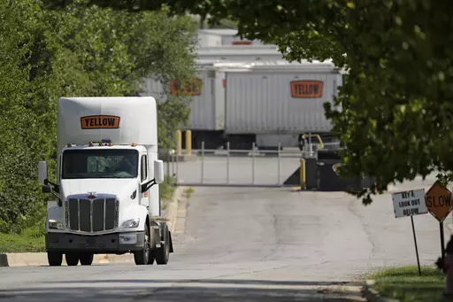 Yellow Corp. trucks are seen at a YRC Freight terminal Friday, July 28, 2023, in Kansas City, Mo. After years of financial struggles, Yellow is reportedly preparing for bankruptcy and seeing customers leave in large numbers — heightening risk for future liquidation. While no official decision has been announced by the company, the prospect of bankruptcy has renewed attention around Yellow's ongoing negotiations with unionized workers, a $700 million pandemic-era loan from the government and ot