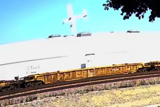 This image taken from video, shows a small plane about to crash into a commercial building in Fullerton, Calif. on Thursday, Jan. 2, 2025. (RUCCI FORGED via AP)