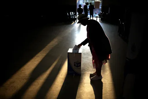 A woman casts her ballot at a polling station, during general elections in Eshowe, South Africa, on May 29, 2024. (AP Photo/Emilio Morenatti, File)