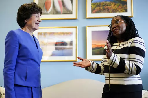 Supreme Court nominee Ketanji Brown Jackson meets with Sen. Susan Collins, R-Maine, on Capitol Hill in Washington, Tuesday, March 8, 2022. Judge Jackson's confirmation hearing starts March 21. If confirmed, she would be the court's first Black female justice. (AP Photo/Carolyn Kaster)