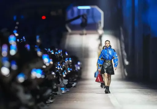 Models wear creations for the Louis Vuitton Pre-Fall 2023 show in Seoul, South Korea, Saturday, April 29, 2023. (AP Photo/Lee Jin-man)