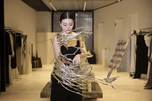 Singapore designer Grace Ling displays 3D printed designs from her New York Fashion Week collection on Friday, Sept. 13, 2024, in New York. Ling is one of ten designers competing in the 2024 CFDA/Vogue Fashion Fund. (Photo by Matt Licari/Invision/AP)