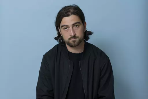 Singer-songwriter Noah Kahan poses for a portrait in New York on June 7, 2023, to promote his album "Stick Season." (Photo by Christopher Smith/Invision/AP)