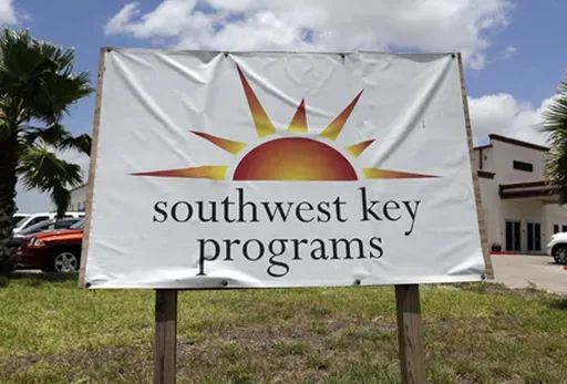 A Southwest Key Programs sign is displayed on June 20, 2014, in Brownsville, Texas. Southwest Key, the largest housing provider for unaccompanied migrant children has been accused of “severe, pervasive, and unwelcome sexual abuse of and harassment” of children in its care, the Justice Department said Thursday, July 18, 2024. (AP Photo/Eric Gay, File)