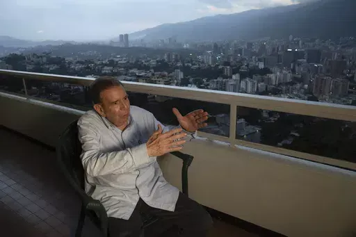 Venezuelan presidential candidate Edmundo González Urrutia of the Democratic Unitary Platform (PUD), the alliance that brings together the main parties and leaders of the opposition, speaks during an interview at his home in Caracas, Venezuela, Thursday, May 9, 2024. (AP Photo/Ariana Cubillos)