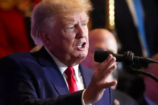 Former President Donald Trump speaks at a campaign event at the South Carolina Statehouse, Jan. 28, 2023, in Columbia, S.C. Trump and his allies have been put on notice by a prosecutor, but the warning didn’t come from anyone at the Justice Department. It's from a Georgia prosecutor who indicates she is likely to seek criminal charges soon in a two-year election subversion probe. (AP Photo/Alex Brandon, File)