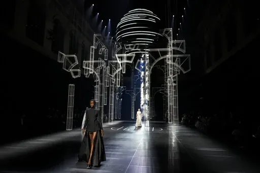 A model wears a creation for the Fendi Spring-Summer 2022 Haute Couture fashion collection, in Paris, Thursday, Jan. 27, 2022. (AP Photo/Thibault Camus)