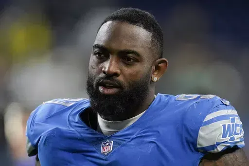 Detroit Lions defensive end Michael Brockers watches against the Philadelphia Eagles during an NFL football game in Detroit, Sunday, Oct. 31, 2021. Brockers, a 2012 first-round draft pick who played on the defensive line for three NFL teams over 11 seasons, is retiring from football. The 33-year-old Brockers, who didn't play in 2023, made the announcement on Instagram Thursday, May 16, 2024. (AP Photo/Paul Sancya, FIle)