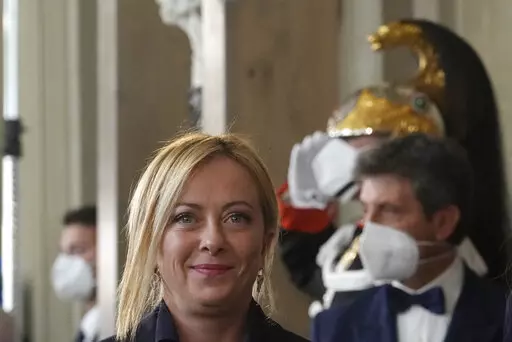 Brothers of Italy's leader Giorgia Meloni arrives at the Quirinale Presidential Palace after a meeting with Italian President Sergio Mattarella as part of a round of consultations with party leaders to try and form a new government, in Rome, on Oct. 21, 2022. As she becomes Italy's first female premier, with the world is watching closely to see if she will emerge as a firebrand leader of a far-right party with neo-fascist roots or the more moderate right-wing politician who captured 26% of the v