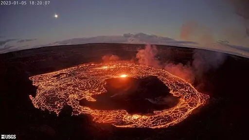 This webcam image provided by the U.S. Geological Survey shows Hawaii’s Kilauea volcano, from the west rim of the summit caldera, looking east, Thursday, Jan. 5, 2023. Hawaii's Kilauea began erupting inside its summit crater Thursday, the U.S. Geological Survey said, less than one month after the volcano and its larger neighbor Mauna Loa stopped releasing lava. ( U.S. Geological Survey via AP)