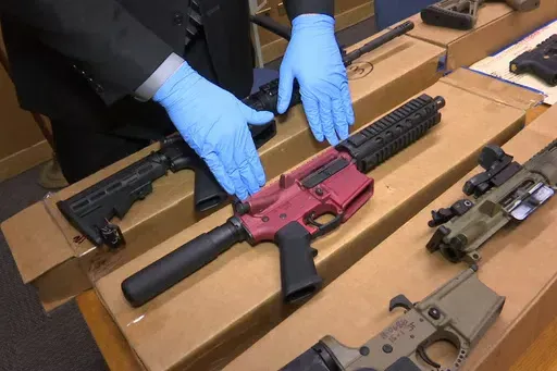 "Ghost guns" are displayed at the headquarters of the San Francisco Police Department in San Francisco, Nov. 27, 2019. Two gun parts manufacturers have agreed to halt sales of their products in Philadelphia and elsewhere in Pennsylvania, city officials said Thursday, April 11, 2024, announcing a settlement of their lawsuit against the companies. Philadelphia filed suit against Polymer80 and JSD Supply in July 2023, accusing the manufacturers of perpetuating gun violence in the city by manufactur