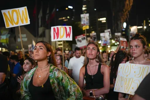 Relatives and supporters of the Israeli hostages held in the Gaza Strip by the Hamas militant group call for their release during rally in Tel Aviv, Israel, Saturday, June 8, 2024. Israel said Saturday it rescued four hostages who were kidnapped in the Hamas-led attack on Oct. 7, the largest such recovery operation since the war began in Gaza. (AP Photo/Ohad Zwigenberg)