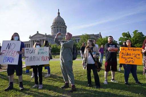 FILE- Abortion-rights supporters rally at the State Capitol, on May 3, 2022, in Oklahoma City. Rape, incest and the health of the fetus or mother were once accepted reasons to obtain an abortion in even the most conservative Republican-led states. Alabama and Oklahoma have enacted a ban with no exceptions. (AP Photo/Sue Ogrocki, File)