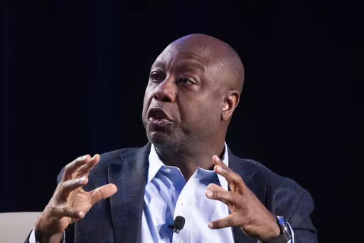 Presidential candidate Sen. Tim Scott, R-S.C., speaks at The Gathering in Atlanta on Friday, Aug. 18, 2023. (AP Photo/Ben Gray, File)