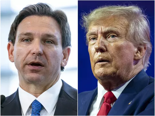This combination of photos shows Florida Gov. Ron DeSantis speaking on April 21, 2023, in Oxon Hill, Md., left, and former President Donald Trump speaking on March 4, 2023, at National Harbor in Oxon Hill, Md. The competition between Trump and DeSantis is intensifying as the former president is scheduling a return trip to Iowa on the same day that the Florida governor was already going to be in the state that will kick off the Republican contest for the White House. (AP Photo/Alex Brandon)