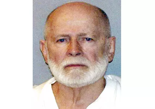 This June 23, 2011, file booking photo provided by the U.S. Marshals Service shows James "Whitey" Bulger. Three men, including a Mafia hitman, have been charged in the killing of Bulger in a West Virginia prison. The Justice Department announced the charges against Fotios "Freddy" Geas, Paul J. DeCologero and Sean McKinnon on Thursday, Aug. 18, 2022. (U.S. Marshals Service via AP, File)