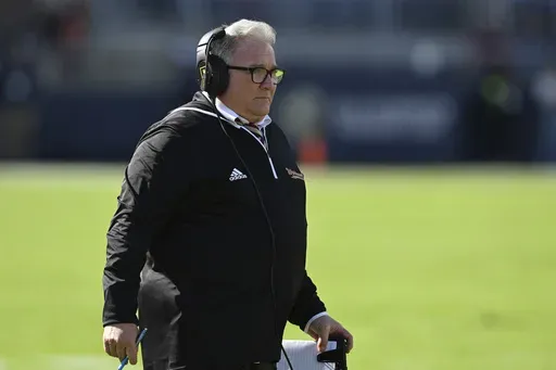 Louisiana Monroe head coach Terry Bowden paces along the field during the first half of an NCAA college football game against Mississippi in Oxford, Miss., Saturday, Nov. 18, 2023. (AP Photo/Thomas Graning)