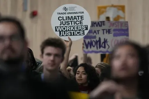 Activists participate in a demonstration for climate justice at the COP29 U.N. Climate Summit, Saturday, Nov. 16, 2024, in Baku, Azerbaijan. (AP Photo/Rafiq Maqbool)
