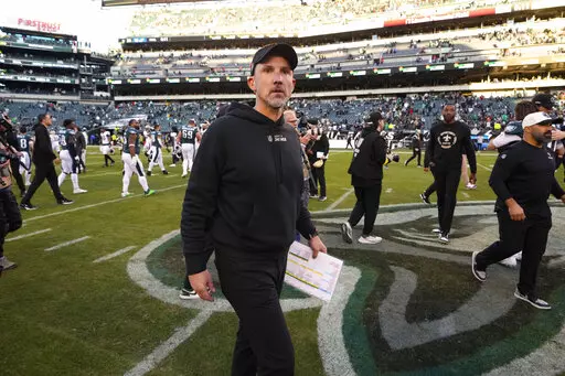 New Orleans Saints head coach Dennis Allen walks off the field after an NFL football game against the Philadelphia Eagles in Philadelphia, Sunday, Jan. 1, 2023. The Saints won 20-10. (AP Photo/Matt Rourke)