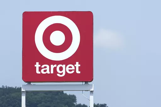 A sign outside a Target store is seen Wednesday, May 24, 2023, in Nashville, Tenn. On May 26, The Associated Press reported on stories circulating online incorrectly claiming Target’s Pride collection features a bathing suit for kids that is labeled “tuck-friendly.” (AP Photo/George Walker IV, File)