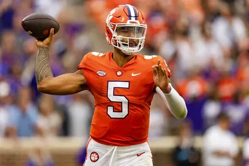 Clemson quarterback DJ Uiagalelei (5) throws the ball in the third quarter against the Furman during an NCAA college football game in Clemson, S.C., Saturday, Sept. 10, 2022. (AP Photo/Jacob Kupferman)