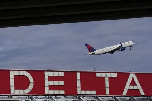 A Delta Air Lines plane takes off from Hartsfield-Jackson Atlanta International Airport in Atlanta, Nov. 22, 2022. Delta announced Thursday, Jan. 5, 2023, that it will provide free Wi-Fi service on most of its U.S. flights starting in February. (AP Photo/Brynn Anderson, File)