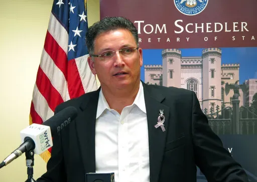 Former Louisiana state Rep. John Schroder, R-Covington, speaks after completing his paperwork to run for state treasurer, July 12, 2017, in Baton Rouge, La. Schroder told supporters Monday, Jan. 9, 2023, that he is officially running for governor. (AP Photo/Melinda Deslatte, File)