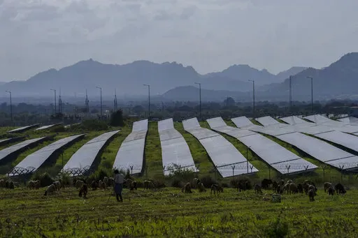 A solar power plant sits in Pavagada Tumkur district, in the southern Indian state of Karnataka, India, Thursday, Sept. 15, 2022. For countries to transition away from fossil fuels and toward cleaner energies like solar power, supply chains for components need to be more geographically diverse, officials said during a conference on solar energy in New Delhi said on Tuesday, Oct. 18. (AP Photo/Rafiq Maqbool)