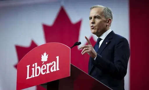 Liberal Party of Canada Leader Mark Carney delivers his speech after being announced as the winner of the party leadership at the announcement event in Ottawa, Ontario, Sunday, March 9, 2025. (Sean Kilpatrick/The Canadian Press via AP)