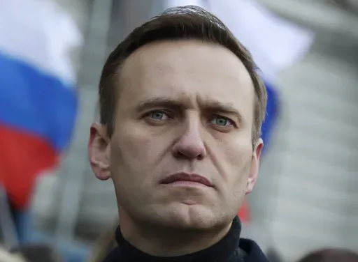 Russian opposition activist Alexei Navalny takes part in a march in memory of opposition leader Boris Nemtsov in Moscow, Russia on Feb. 29, 2020. Associates of imprisoned Russian opposition leader Alexei Navalny say he has been located at a prison colony above the Arctic Circle nearly three weeks after contact with him was lost. Navalny, the most prominent foe of Russian President Vladimir Putin, is serving a 19-year sentence on charges of extremism. (AP Photo/Pavel Golovkin, File)