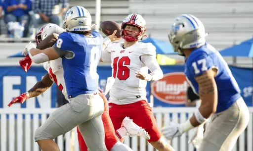 Western Kentucky quarterback Austin Reed (16) throws a pass against Middle Tennessee State during an NCAA college football game Saturday, Oct. 15, 2022, in Murfreesboro, Tenn. (Grace Ramey/Daily News via AP)