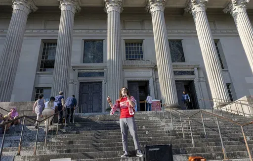 Tulane University student Rory MacDonald stands in front of the Orleans Parish Criminal District Court on Friday, Sept. 20, 2024. (Chris Granger/The Times-Picayune/The New Orleans Advocate via AP)