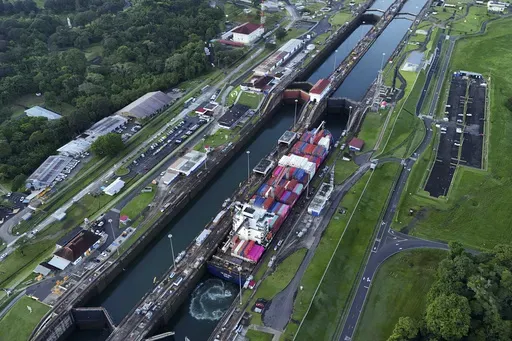 A cargo ship traverses the Agua Clara Locks of the Panama Canal in Colon, Panama, Sept. 2, 2024. (AP Photo/Matias Delacroix, File)